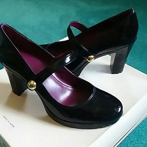 Coach black patent Mary Jane heels with gold snap.